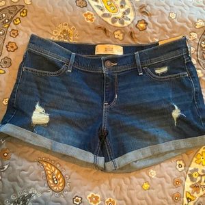 NWT low rise midi distressed shorts